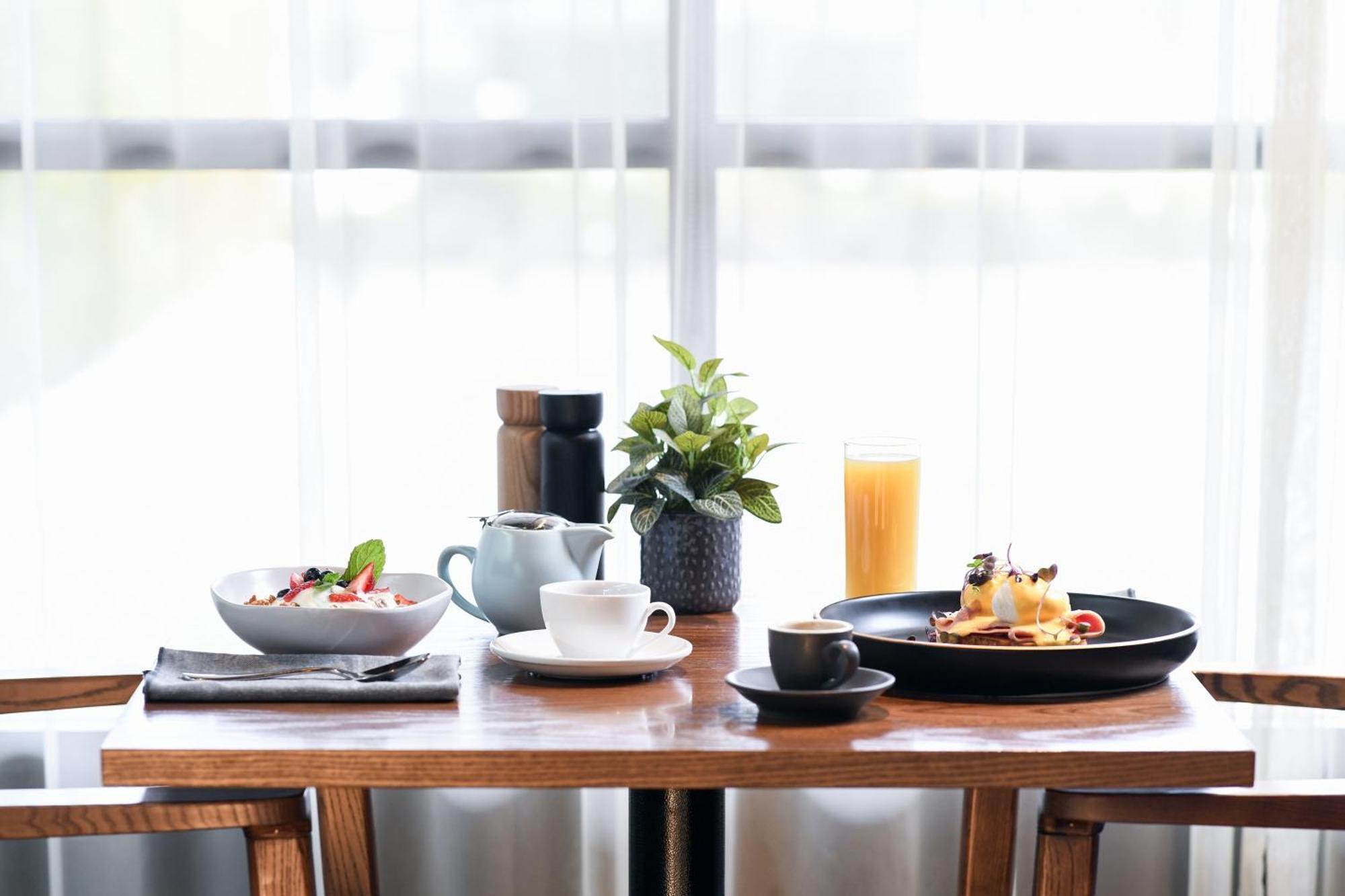 파워하우스 호텔 탬워스 바이 리지스 외부 사진 A breakfast table